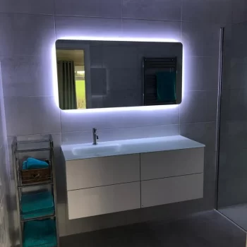 Backlit LED mirror in bathroom