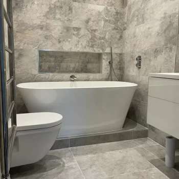 Modern grey bathroom by Bathroom Inspirations