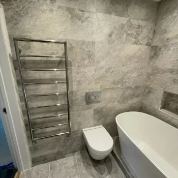 Modern grey marble bathroom by Bathroom Inspirations