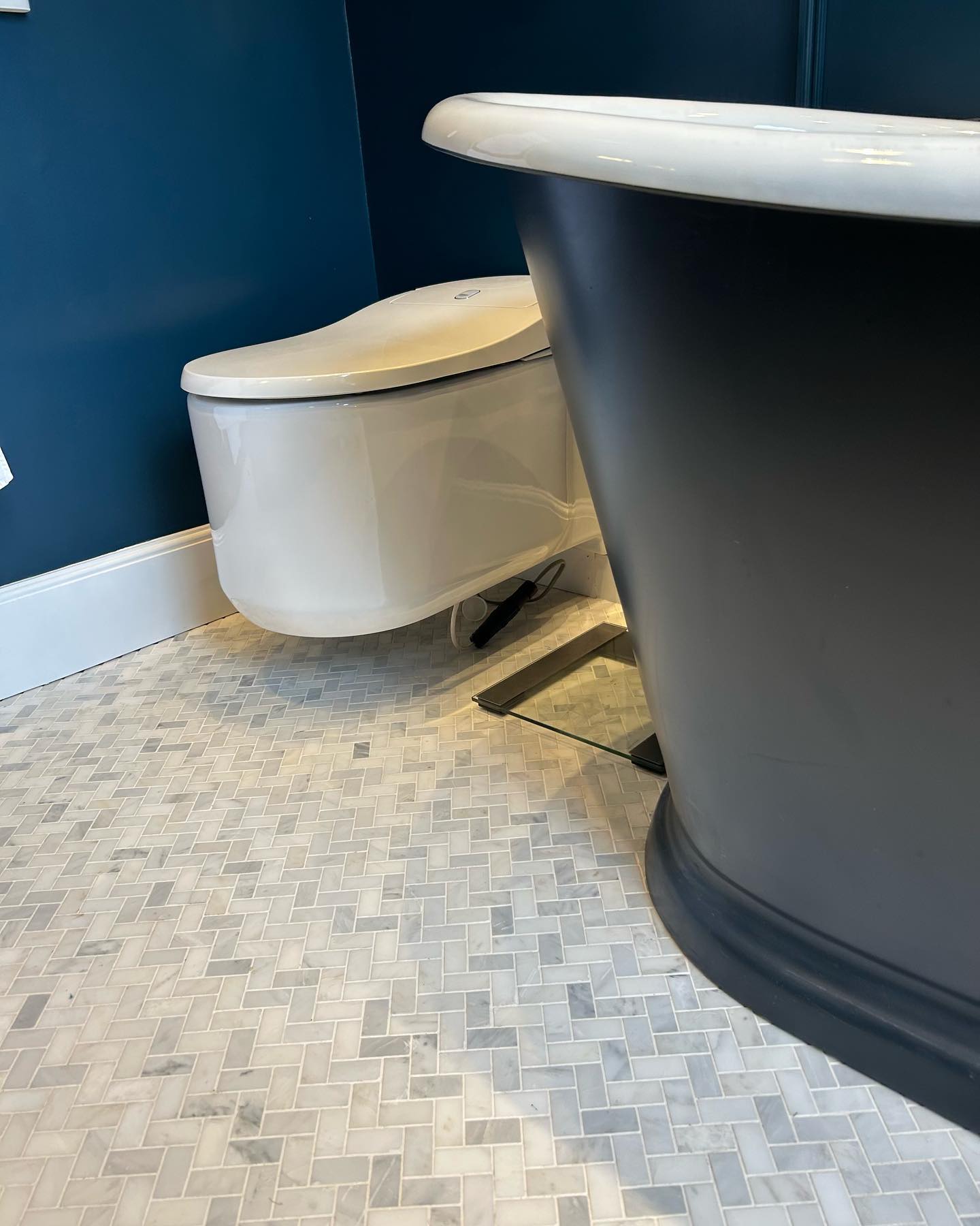 Deep Blue Bathroom with Brass Fixtures Bathroom Inspirations